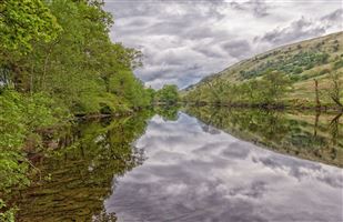 Beautiful still water reflecting the amazing landscape.

Photography by Malcolm J Smith