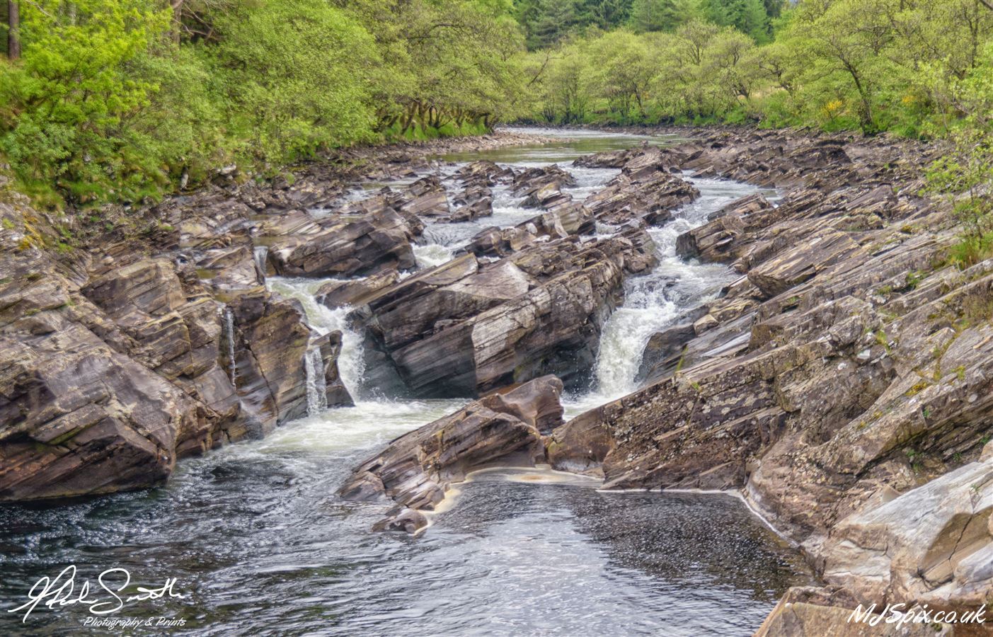 River Orchy flowing over some of the many small falls.

Photography by Malcolm J Smith