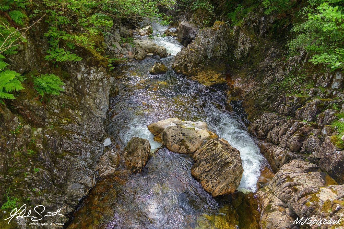 The Rive Coe running under the bridge that takes you to the foot of An Torr

Photography by Malcolm J Smith